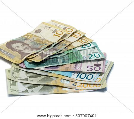 Serbian Money Stack Of Banknotes Of Different Value In Serbian Dinars Isolated On A White Background