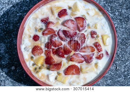 Mango, Passion Fruit, Strawberry And Yogurt Brulee. Fruit Dessert On Breakfast With Wedges Of Perfec