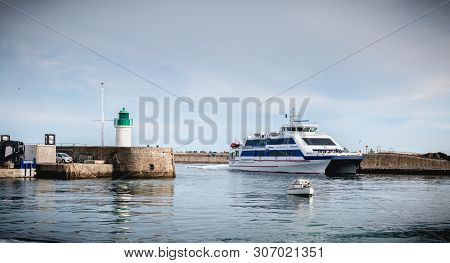 Ferry That Enters The Harbor Of The Island Of Yeu, France