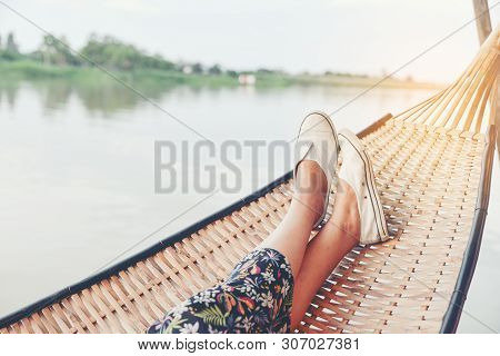 Lifestyle Of Alone Woman,feet Of Hipster Calm People Sleeping And Relaxing In Hammock With Nature Ba