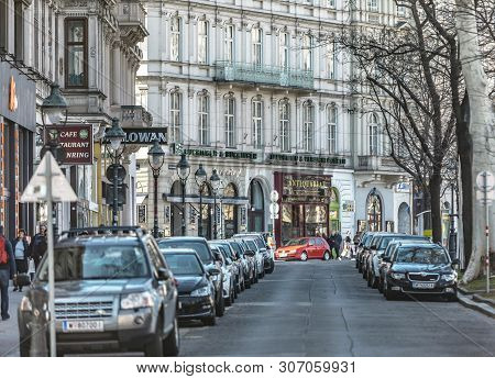 Viena, Austria - March 18, 2019: Urban View Of The Austrian Street With Cars And Shops