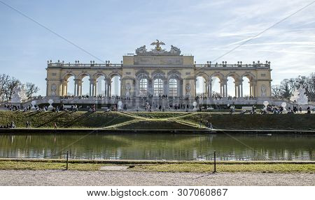 Viena, Austria - March 18, 2019: View On The Austrian Arch Near The River On The Blue Summer Sky Bac
