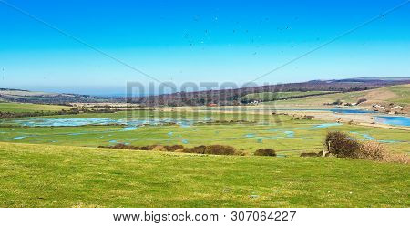 Walk To Cuckmere Haven Near Seaford, East Sussex, England. South Downs National Park. View Of Blue W