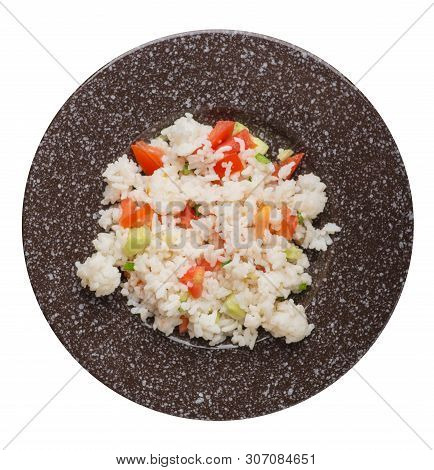 Rice With Vegetables On A Brown With Murble Crumb Plate Isolated On White Background . Rice With Tom