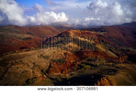 aerial view of Carpathian mountains countryside in autumn morning, Romania