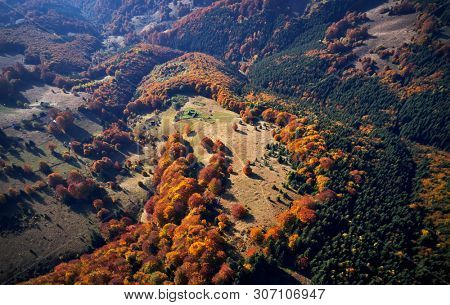aerial view of Carpathian mountains countryside in autumn morning, Romania