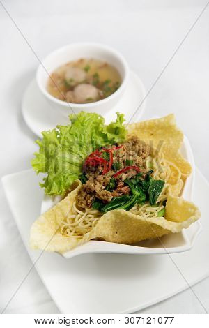 Cwie Mie Or Cui Mie, Asian Noodles With Chicken, Vegetable, And Meatballs In A Bowl
