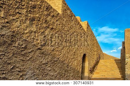 Stone Wall And Staircase To The Balcony Of Old Fort In The Evening. From Muttrah, Muscat.