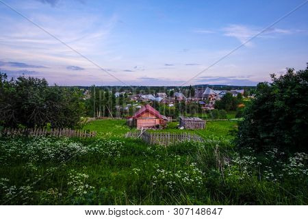 landscape with the image of russian north village Ferapontovo in Vologda region