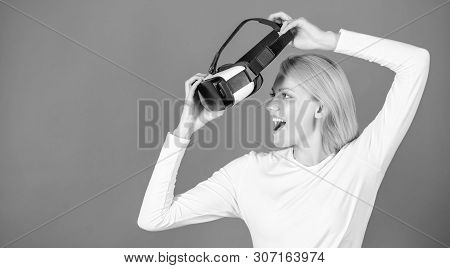 Portrait Of Young Woman Wearing Vr Goggles, Experiencing Virtual Reality Using 3d Headset. Woman Wit