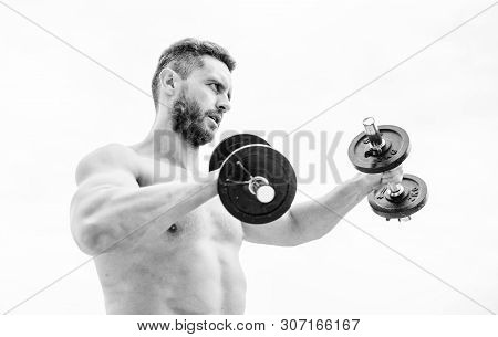 Training To Be The Best. Success. Perfect Biceps. Fitness And Sport Equipment. Man Sportsman With St