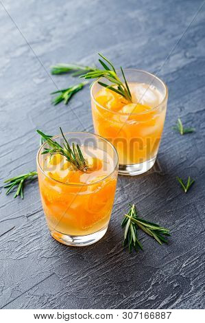 Summer Drinks, Rosemary Aprcot Cocktails With Ice In Glasses. Refreshing Summer Homemade Alcoholic O