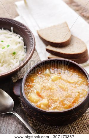Kapustnyak - Traditional Ukrainian Winter Soup With Sauerkraut And Millet, Obligatory Dish On The Ch