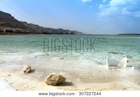Crystal Sal Beach On Dead Sea Coast, Israel. The Dead Sea Surface And Shores Are 430.5 M Below Sea L