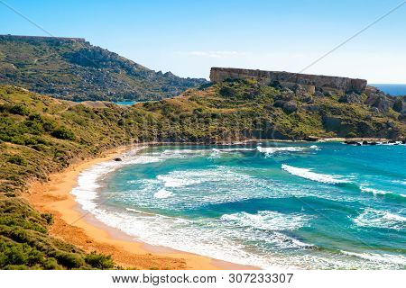 Malta Beach. Beautiful Sand Beach On Malta. Ghajn Tuffieha Bay In Summer. Tropical Resort. Scenic La