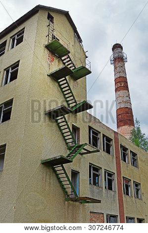 The Half-ruined Building Of An Old Plant