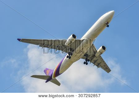 Airplane Landing At The Airport