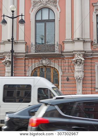Saint-petersburg, Russia - May 1, 2019: Facade Of Old Building On Nevsky Prospect With Cars Riding A