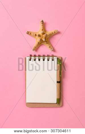 Blank Note Book With Starfish Or Seashells On A Pink Background , Summer Vaction Concept
