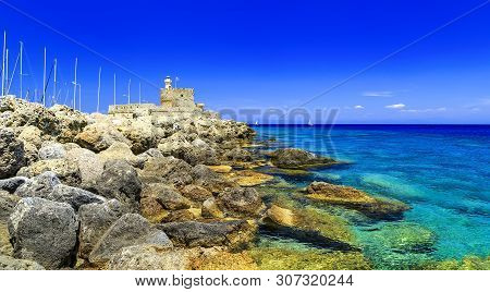 Saint Agios Nikolaos Fortress, Port Mandraki At Rhodes Island In Greece