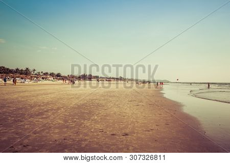 Goa, India - December 20, 2018: View Of The Morjim Beach. Beach Life