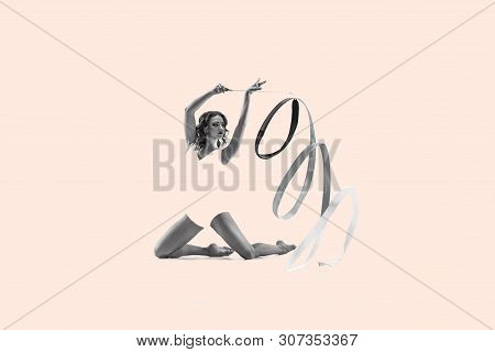 The Portrait Of Beautiful Young Brunette Woman Gymnast Training Calilisthenics Exercise With The Rib