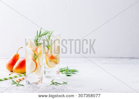 Summer Drinks, Rosemary Pear Cocktails With Ice In Glasses. Refreshing Summer Homemade Alcoholic Or 