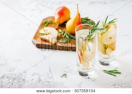 Summer Drinks, Rosemary Pear Cocktails With Ice N Glasses. Refreshing Summer Homemade Alcoholic Or N