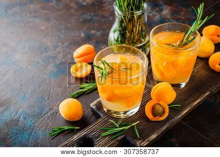 Summer Drinks, Rosemary Aprcot Cocktails With Ice In Glasses. Refreshing Summer Homemade Alcoholic O