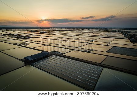 Beautiful Landscape At Sunset Salt Farming. Sea-salt Production In The Country, Sunset In Salt Farmi