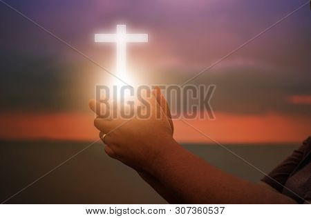 Christian Woman Praying Worship At Sunset. Hands Folded In Prayer. Worship God With Christian Concep