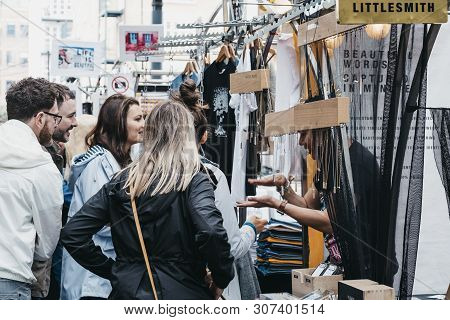 London, Uk - June 15, 2019: People Browsing Items At Stalls Inside Spitalfields Market, One Of The F