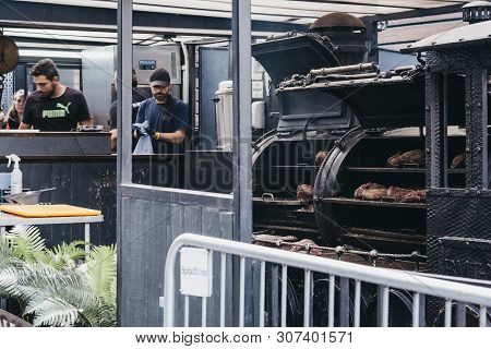London, Uk - June 15, 2019: Staff Preparing Food At A Smokoloco Stall Inside Spitalfields Market, On