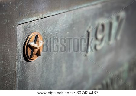 2019 BLADENSBURG MARYLAND USA FEB 25 Peace Cross: Close up of gold star on plaque of World War I Memorial commissioned by the American Legion, built 1919-1925 at a 3-way junction on Bladensburg Rd.