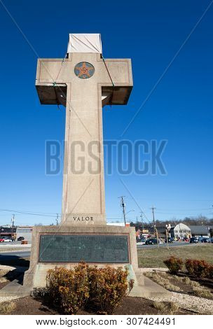 2019 BLADENSBURG MARYLAND USA FEB 25 Peace Cross: Low angle view of the Bladensburg World War I Memorial commissioned by the American Legion, built in 1919-1925 at a 3-way junction on Bladensburg Rd.