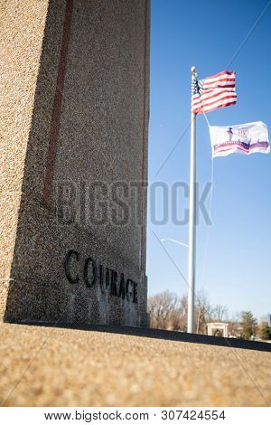 2019 BLADENSBURG MARYLAND USA FEB 25 Peace Cross: The word Courage on the Bladensburg World War I Memorial built by the American Legion for Prince Georges County soldiers who died in the Great War.