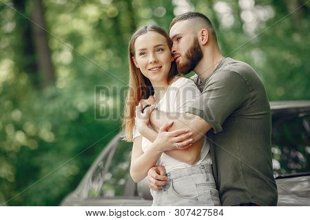 Beautiful Couple Spend Time On A Summer Forest