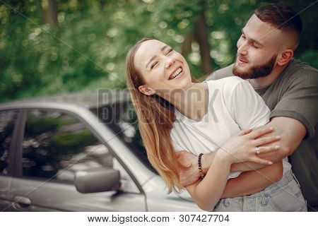 Beautiful Couple Spend Time On A Summer Forest
