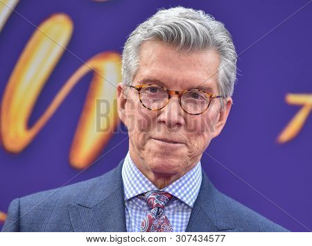 LOS ANGELES - MAY 21:  Michael Buffer arrives for the 'Aladdin' World Premiere on May 21, 2019 in Hollywood, CA