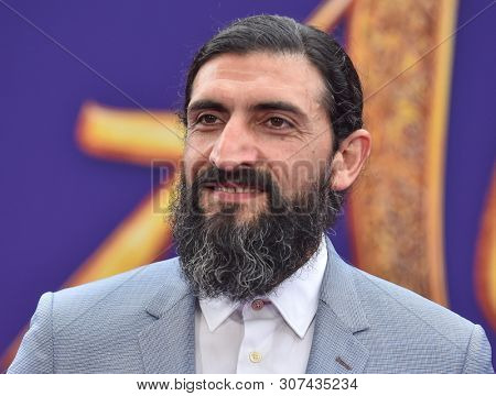 LOS ANGELES - MAY 21:  Numan Acar arrives for the 'Aladdin' World Premiere on May 21, 2019 in Hollywood, CA