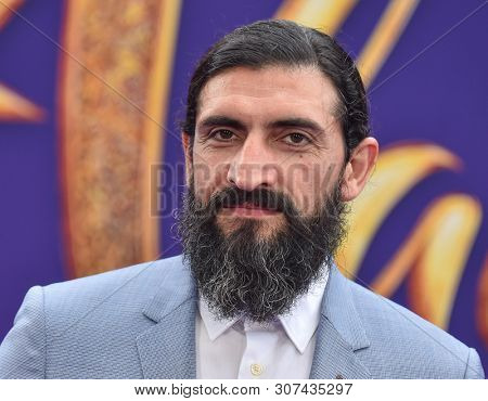 LOS ANGELES - MAY 21:  Numan Acar arrives for the 'Aladdin' World Premiere on May 21, 2019 in Hollywood, CA