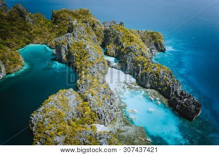 Palawan, Philippines Aerial Drone Natural Scenery Of Turquoise Lagoon And Limestone Cliffs. El Nido 