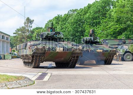 German Infantry Fighting Vehicle Drives On A Street