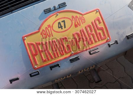 Kazakhstan, Kostanay, 19-06-19, The Emblem Of A Vintage Car Porsche 912. Close-up Of The Back Of A R