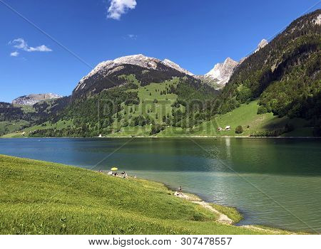 The Schiberg Mountain Above The Wagital Valley Or Waegital And The Wagitalersee Alpine Lake (waegita