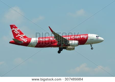 Airplane Landing At Bangkok Airport