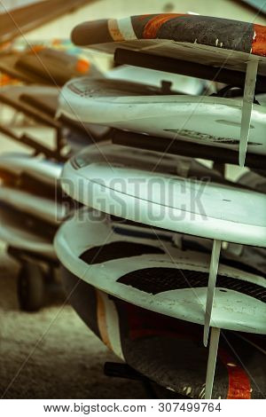 Outdoor Mobile Stand With Surf Surfboards And Windsurfing For Beginners In School