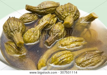 Spanish Pickled Eggplants Served On Bowl. Overhead Shot