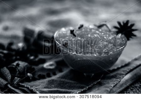Famous Indian Dessert And Sweet Dish In A Glass Bowl On Jute Bag's Surface I.e. Murabba Or Murba Alo