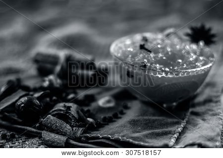 Famous Indian Dessert And Sweet Dish In A Glass Bowl On Jute Bag's Surface I.e. Murabba Or Murba Alo